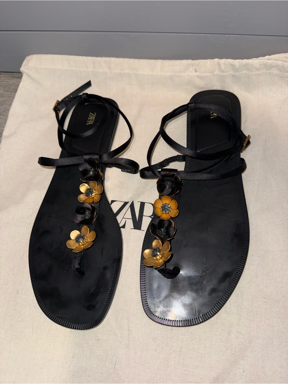 Zara Black Leather T-Strap Floral Accent Sandals